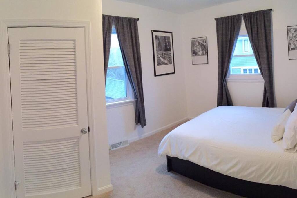 13x11 room with 9' ceiling. Ample closet space. New ikea foam mattress. Black-out curtains. Storage bed frame with four drawers.