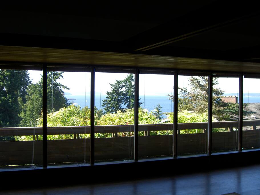 60 foot wall of windows overlooking park and Puget Sound. This house is perfect for winter storms and heavy weather. A gettaway.