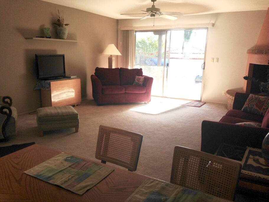 Great room has slider to back patio