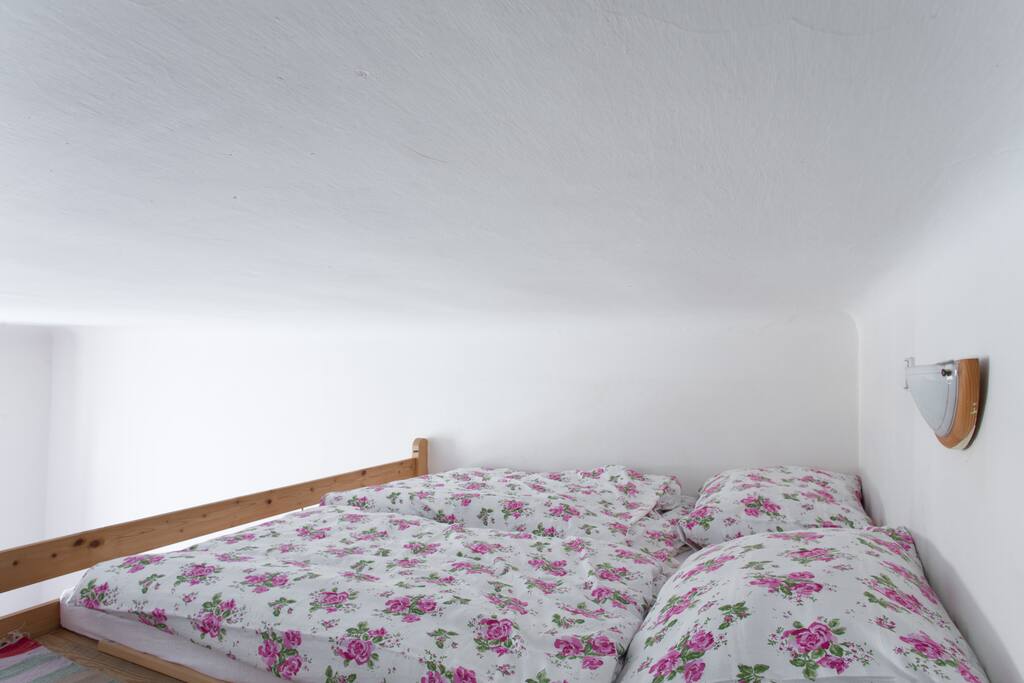 second bedroom on the wooden floor.