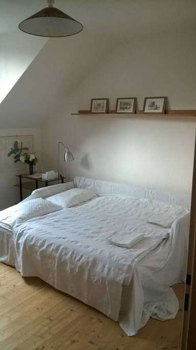 Lockable room with convertible sofa on the first floor