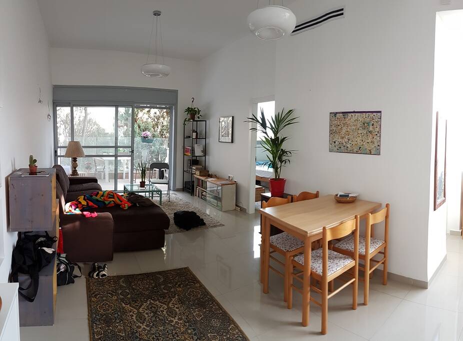 Living room area. Entrance to bedroom is right of the terrace.