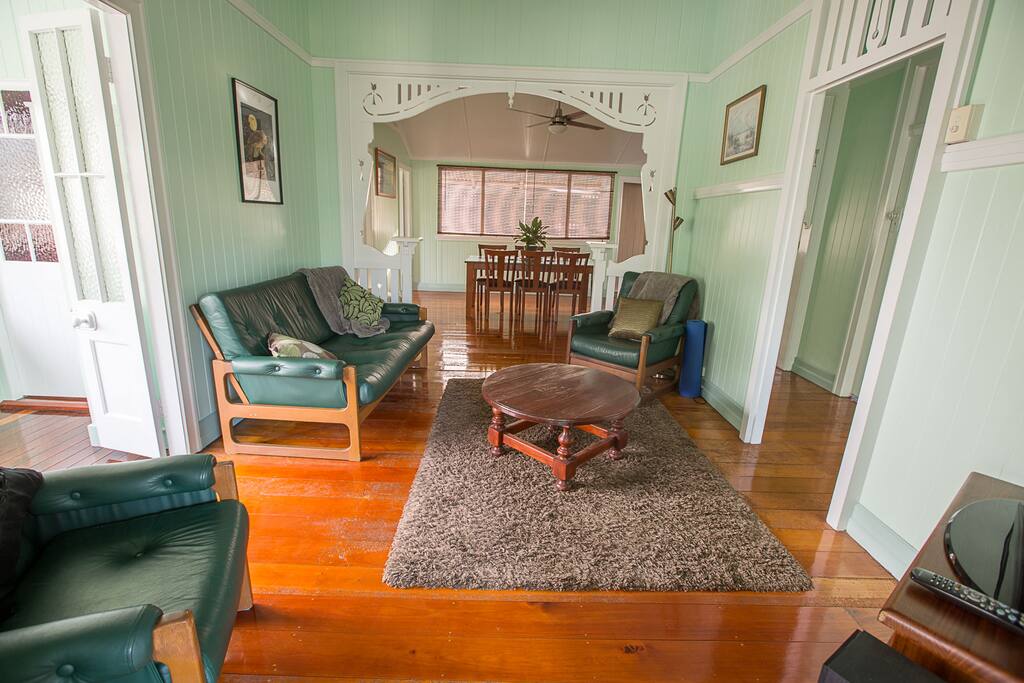 Living room through to dinning space with a warming gas heater for those winter nights