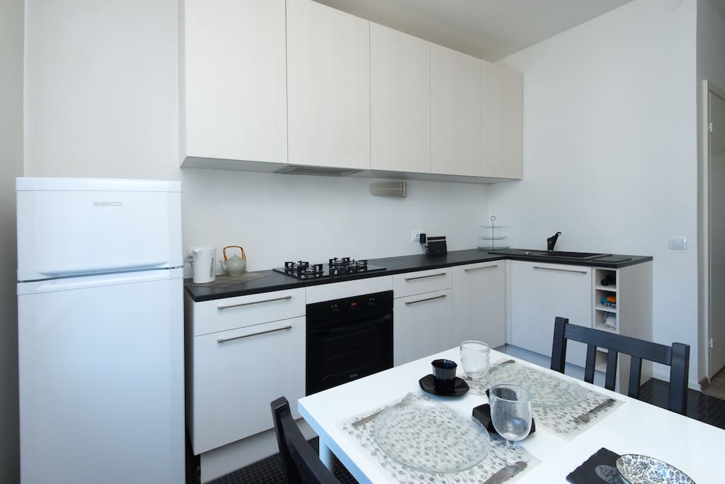 The kitchen is full of light and spacious.