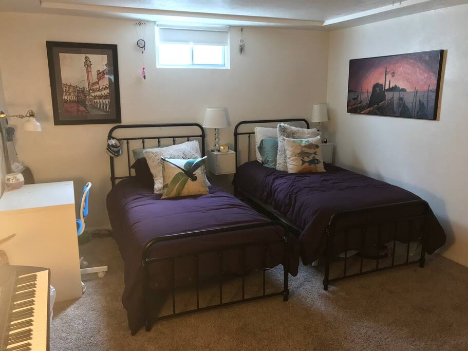 Bedroom 2 features twin beds.