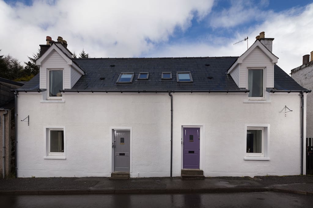 Cleiseabhal cottage with the purple door. Sunshine and Showers.