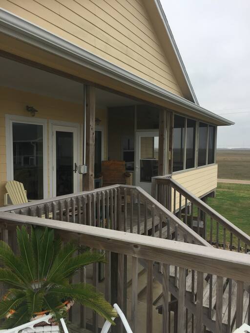 Screened-in deck is a tranquil place to relax and unwind and watch the sunset