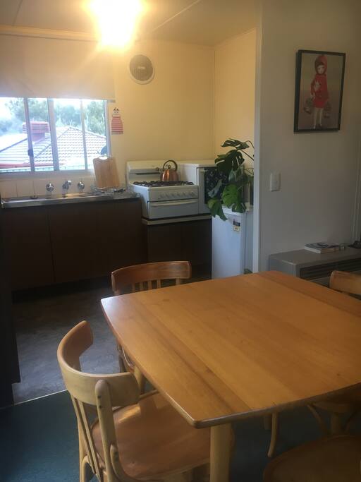Open kitchen, dining and lounge area.