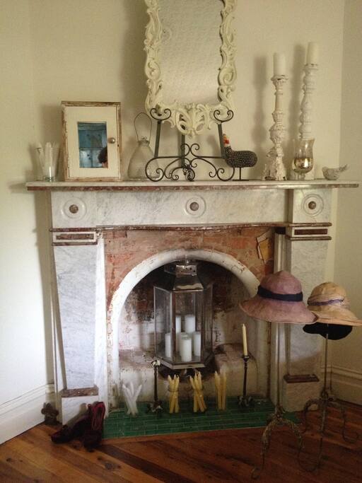 Functional fireplace in guest bedroom