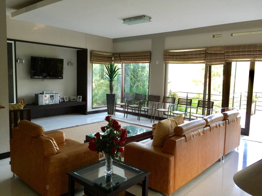 Level 1 - living room with glassed-window overlooking the valley view
