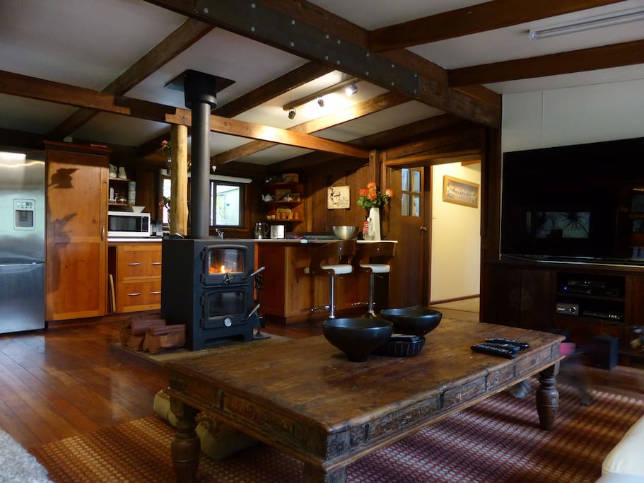 Kitchen and Living areas open plan, large TV