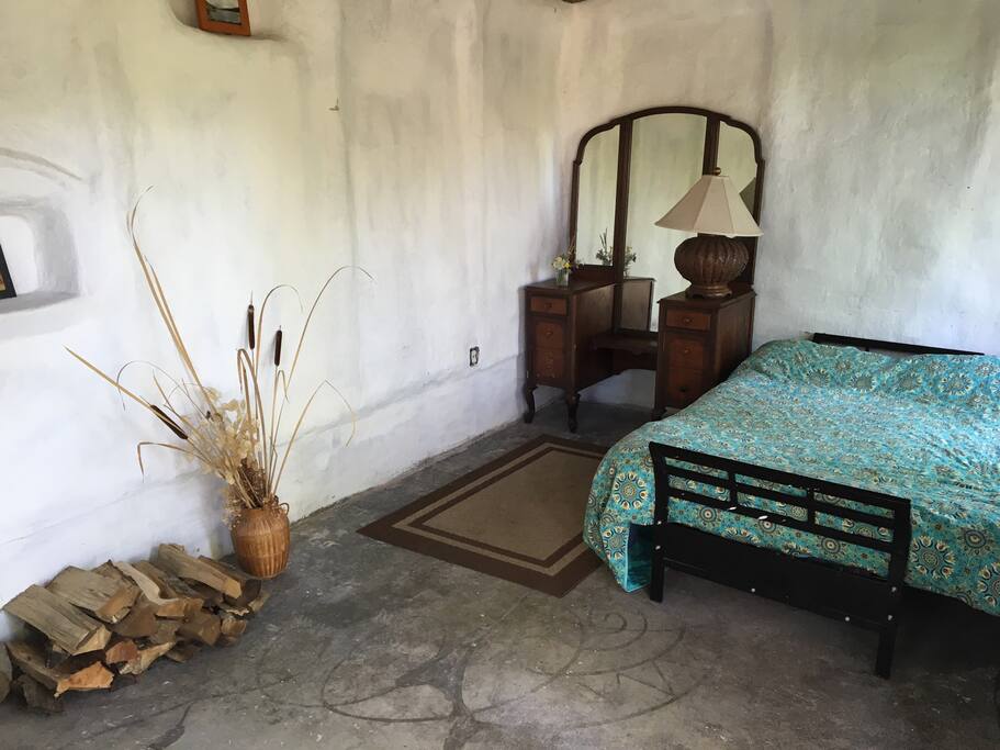 Your bed and dresser and some firewood in the cottage.