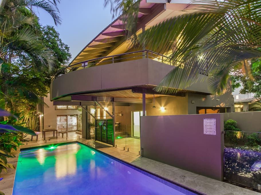 Stunning tropical landscape surrounds this amazing fully heated swimming pool.