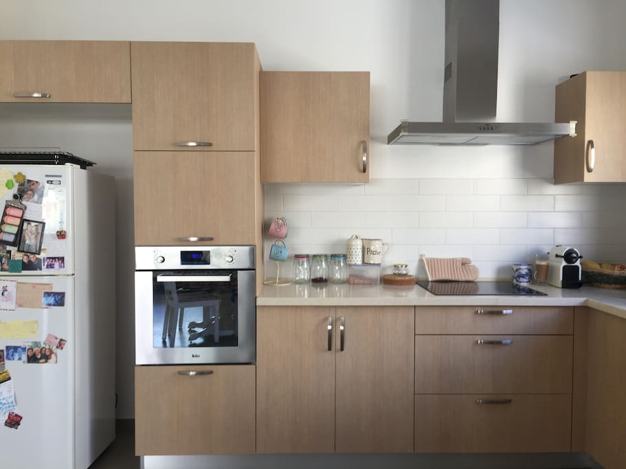 Spacious and well equipped kitchen