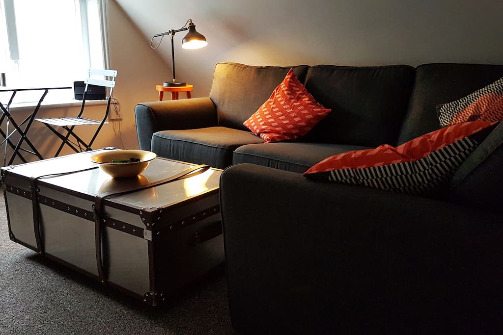 Living room: a sofa bed, dining area, TV with NowTV box and SegaMega drive for those rainy afternoons.