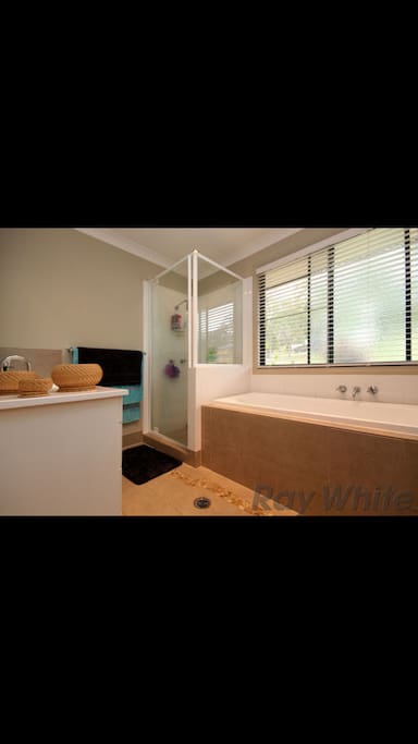 Your private bathroom with deep bath and salts provided