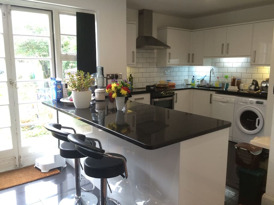 Large kitchen with breakfast bar