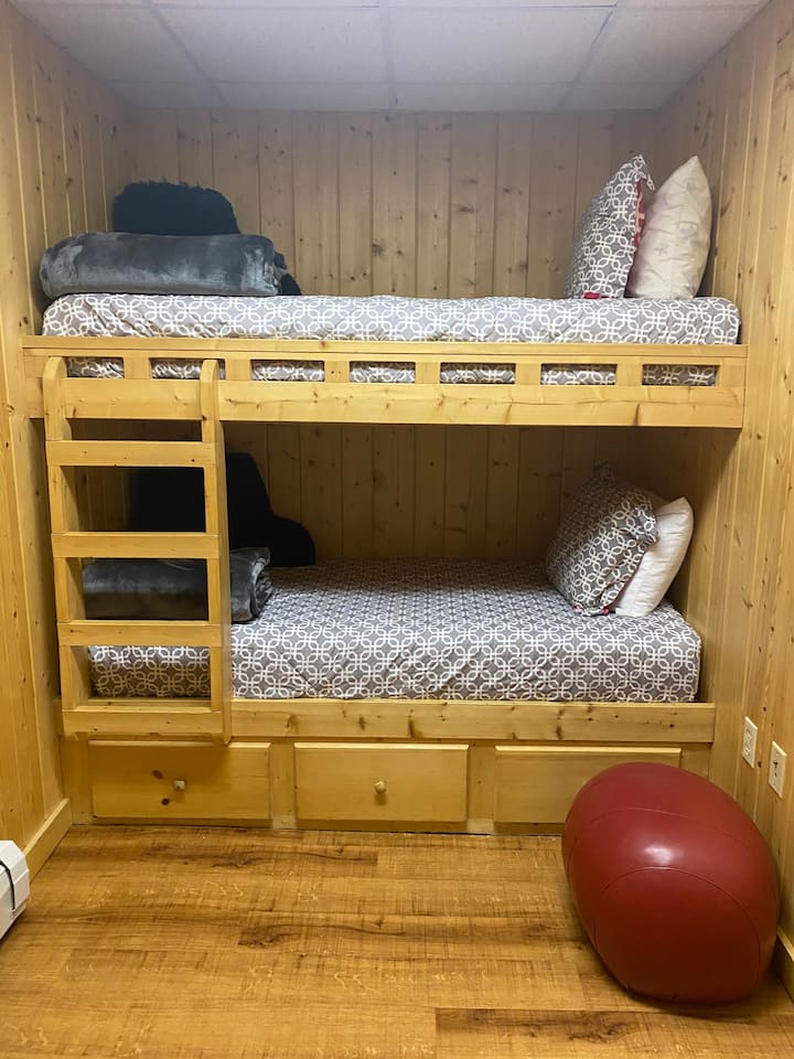 Lower level twin built in bunk beds.