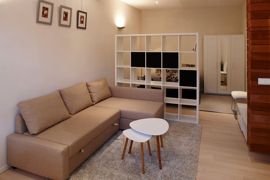 In the room a comfortabel new sofa couch for 2 persons