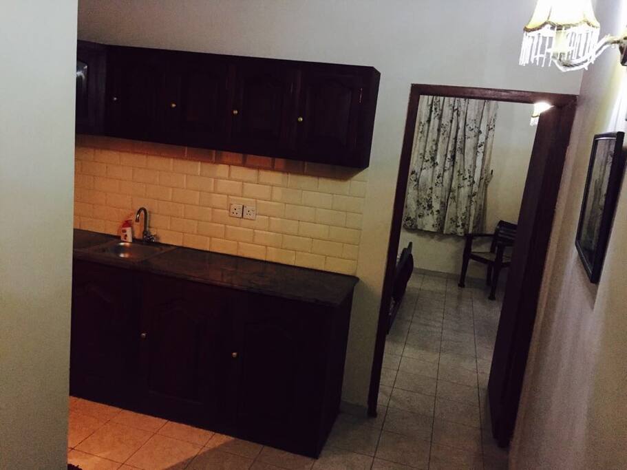 Entrance to the cozy apartment will get you to the kitchen and your bedroom