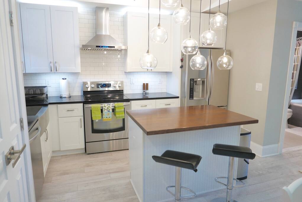 Fully equipped kitchen with all new appliances and amazing lighting