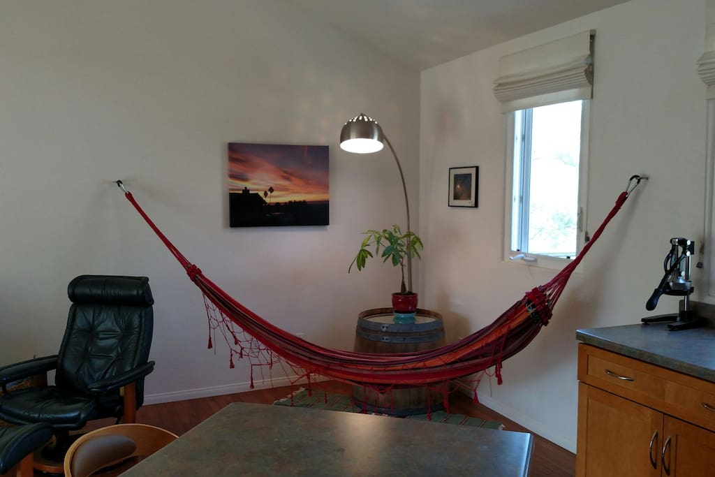 Relax in the upstairs hammock located in the shared living room.