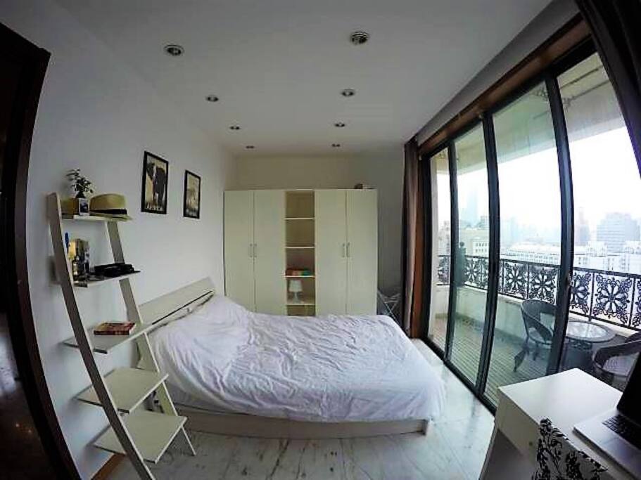 The bedroom and its private balcony