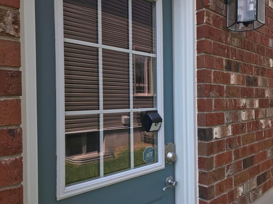 Your entrance with extra lighting for your safety and convenience