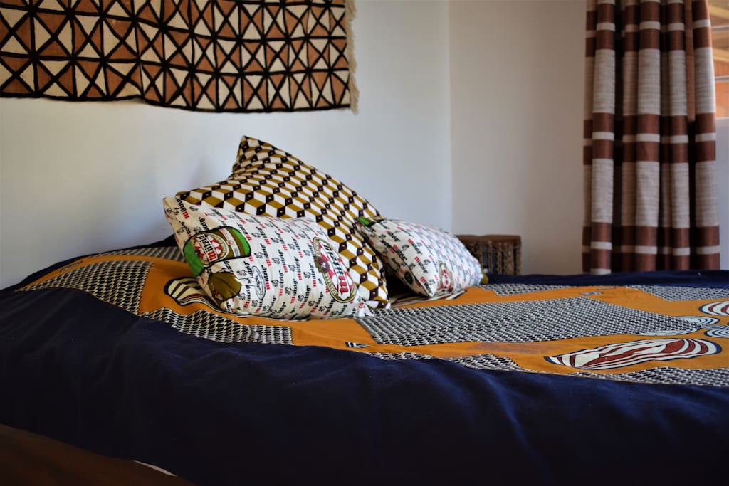 Local kitenge bedspread and pillows