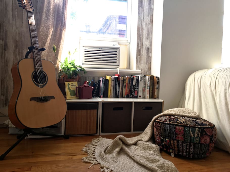 Reading nook/music books. You are welcome to use my 12 string guitar if you feel like tuning it!