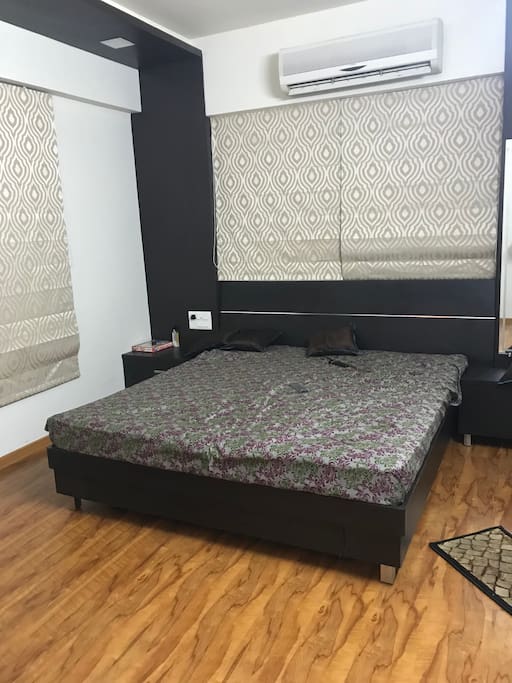 Bedroom 1 with TV and attached bathroom