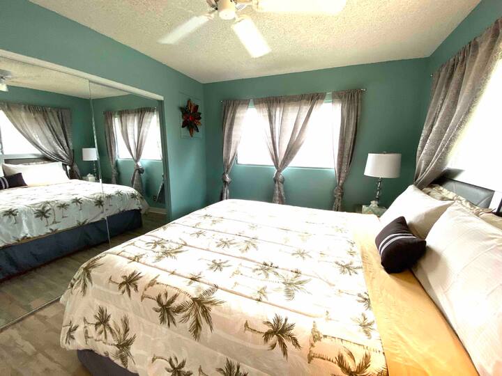 New silver bedroom set with a California King size bed with a very comfortable Nova Foam mattress, 2 nights, 2 bed side lamps, 6 drawer dresser and ceiling fan, also a bedroom A/C unit.