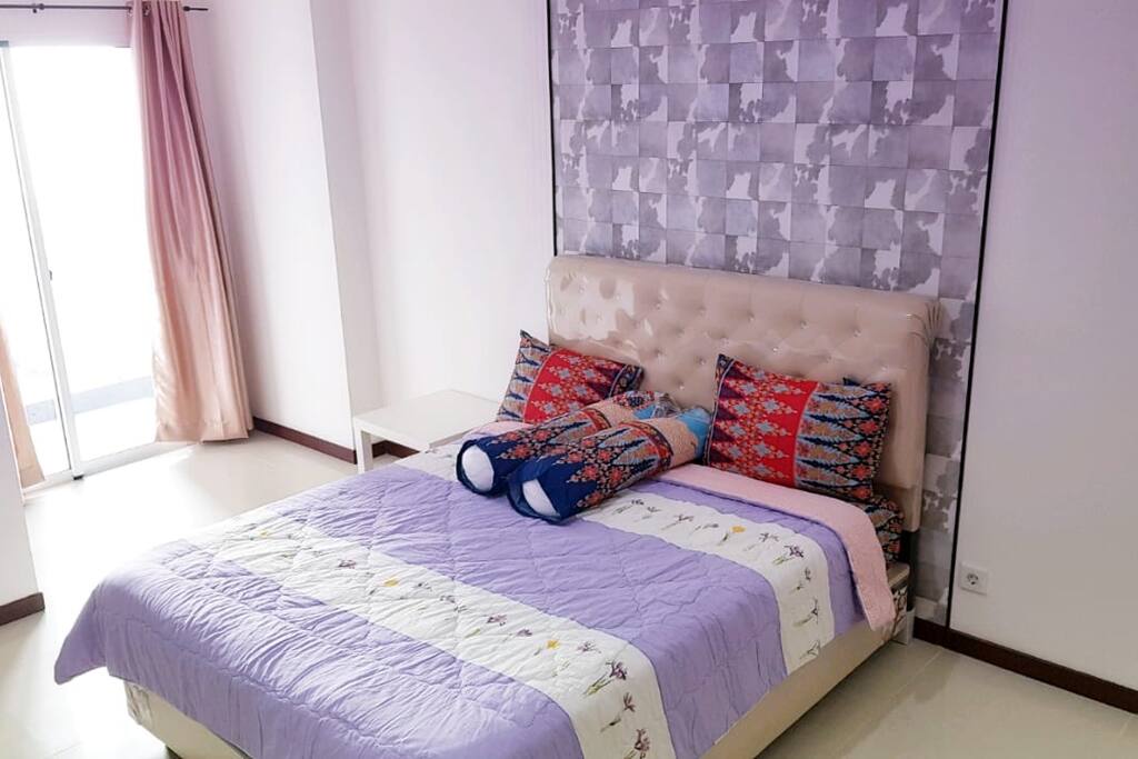Queen Comfy Queen bed for you, with balcony and bathroom inside.