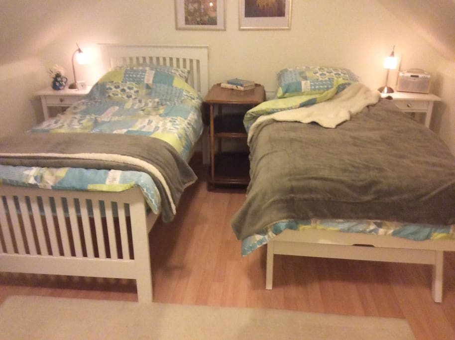 Second bed rolls out from under first bed and trolley table has folding flaps.