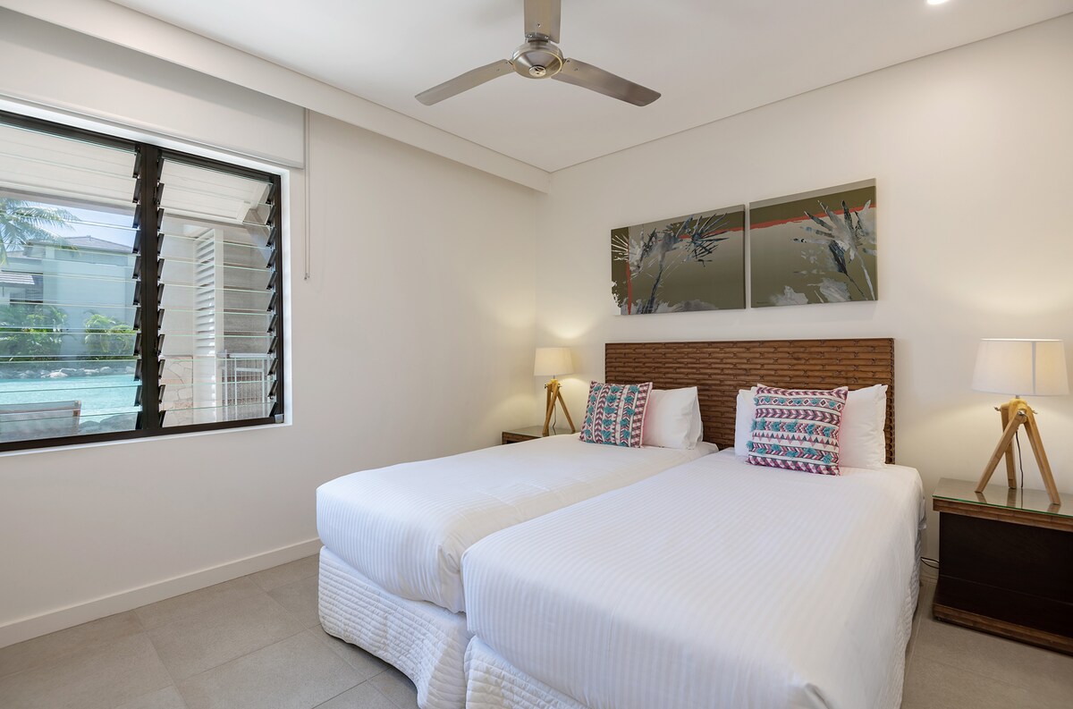 Ideal for both adults and children, the third bedroom offers two comfortable single beds which can be pushed together to create a king bed upon request.