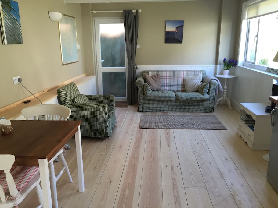 The large and spacious open plan sitting/dining/kitchen area.
