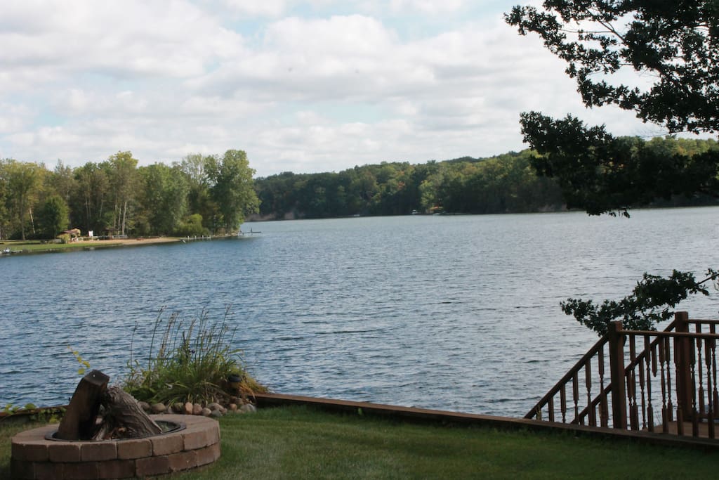 Camp fires overlooking lake