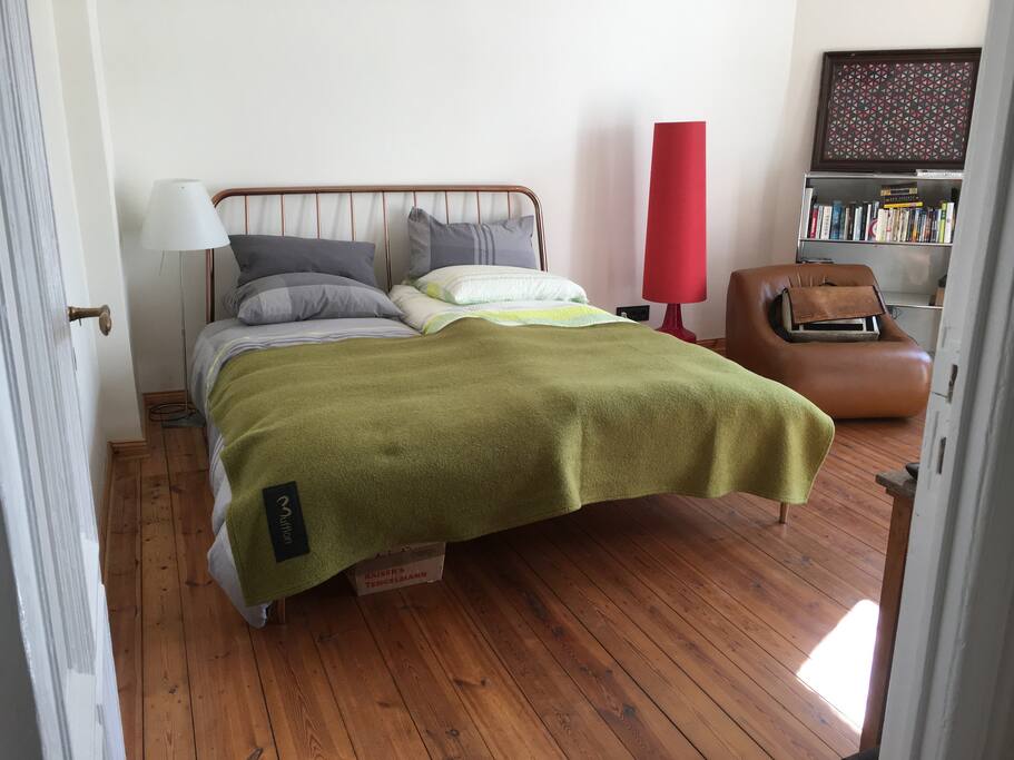 king size bed, old wooden flooring