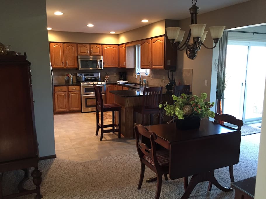 Kitchen and dining area with breakfast nook.