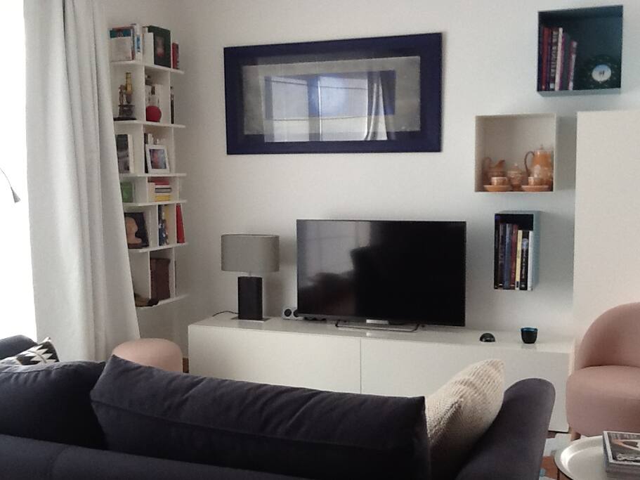 Living room very brightful with a Sofa bed for 2 persons