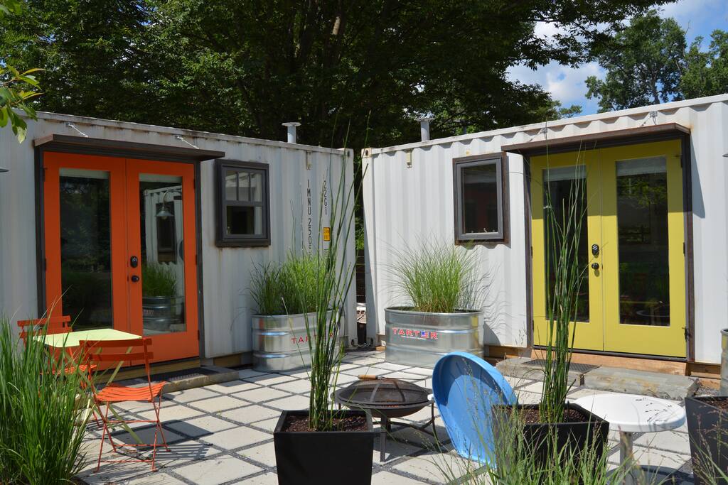 The two units share a patio and fire pit. Wood and fire starting kits are stored under the end of the unit, if you want to hang out by a fire.