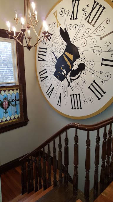 Beautiful stairwell with art & vintage stainglass found on Cherokee