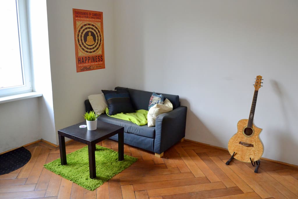 The social area of the room, feel free to use the guitar