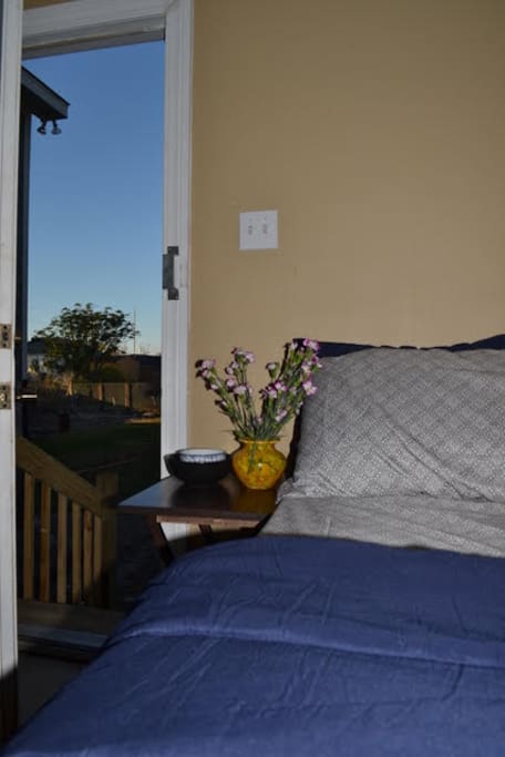 this is a view of the private entrance for guest to use that is located in the rear of house.
It is also where the guest can sit out back amd utilize the backyard however they wish
