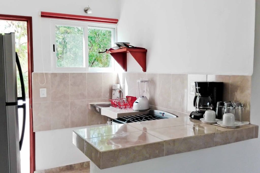 The kitchen has all the necessary dishes for cooking, coffee maker, mixed, gas cooker, big fridge with a freezer...
