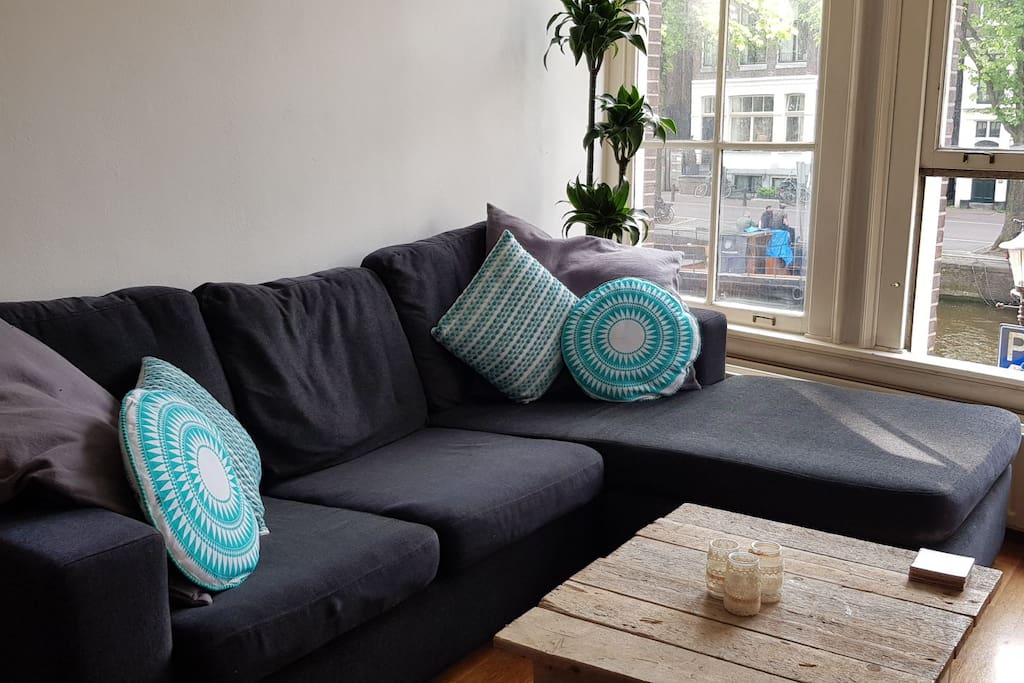 Comfy couch looking out on the canal