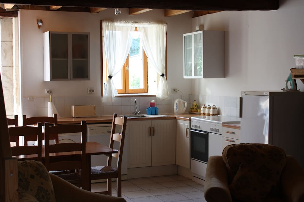 Downstairs open plan kitchen and dining area.