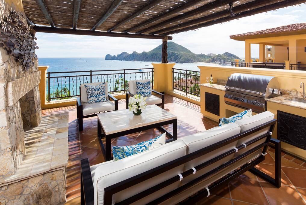 Outside terrace with fireplace and BBQ.