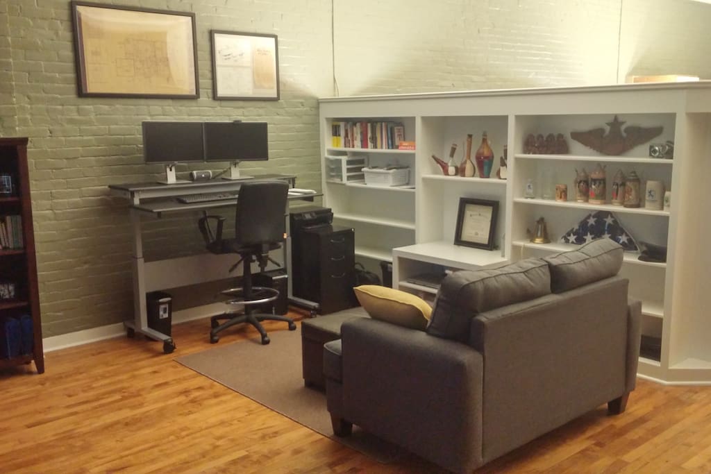 Separate work space with love seat and computer access.