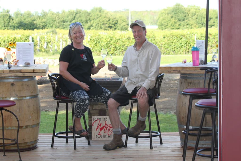 Your hosts - Marc and Norene live next door. Enjoying a bit of a rest on the winery patio overlooking the vineyard.